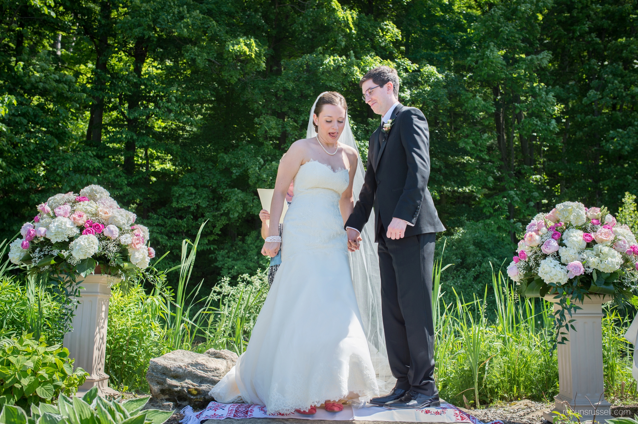 15-bride-and-groom-stand-on-rushnyk-ukrainian-tradition.jpg