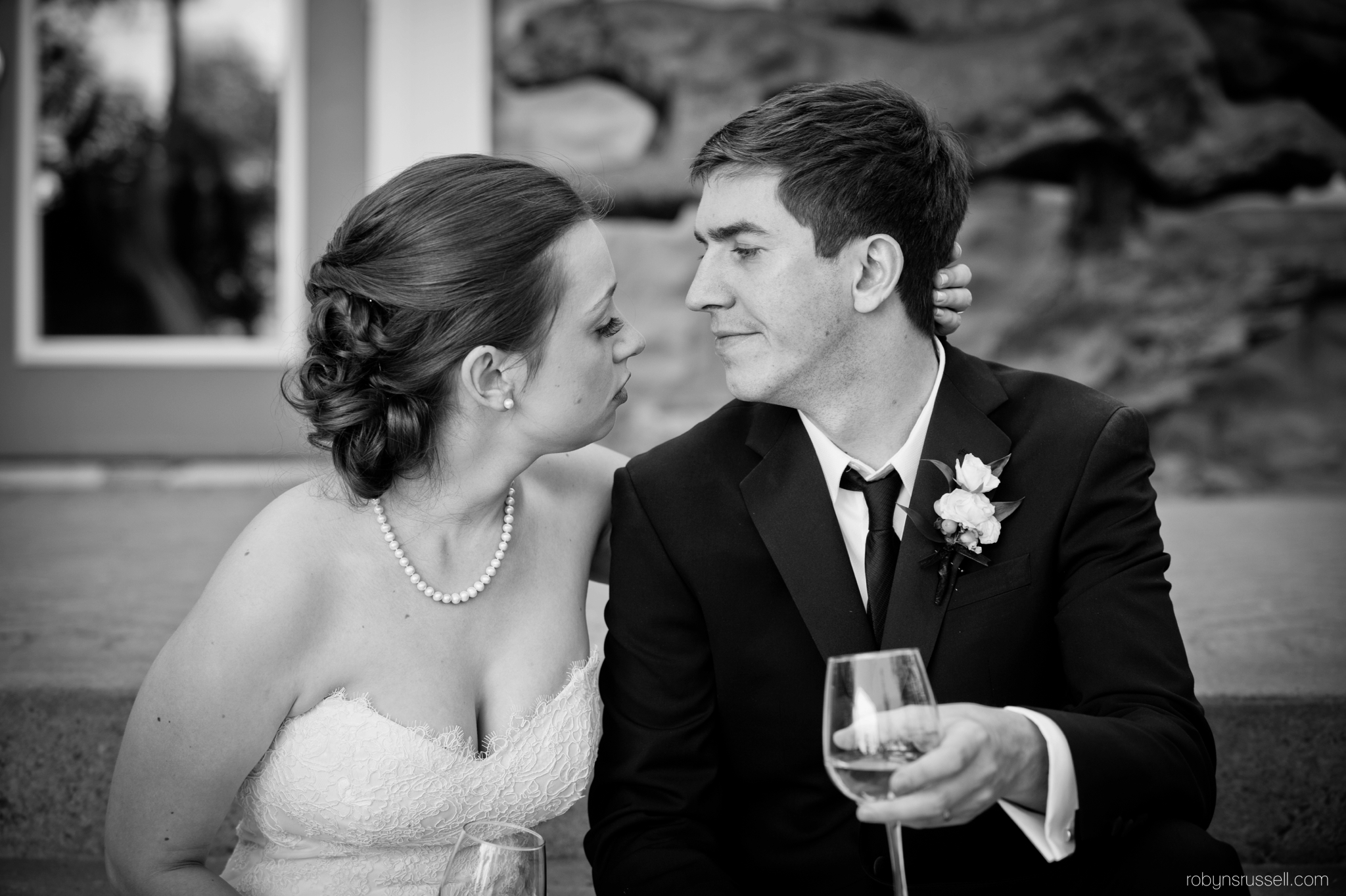 32-bride-and-groom-drinking-champagne.jpg