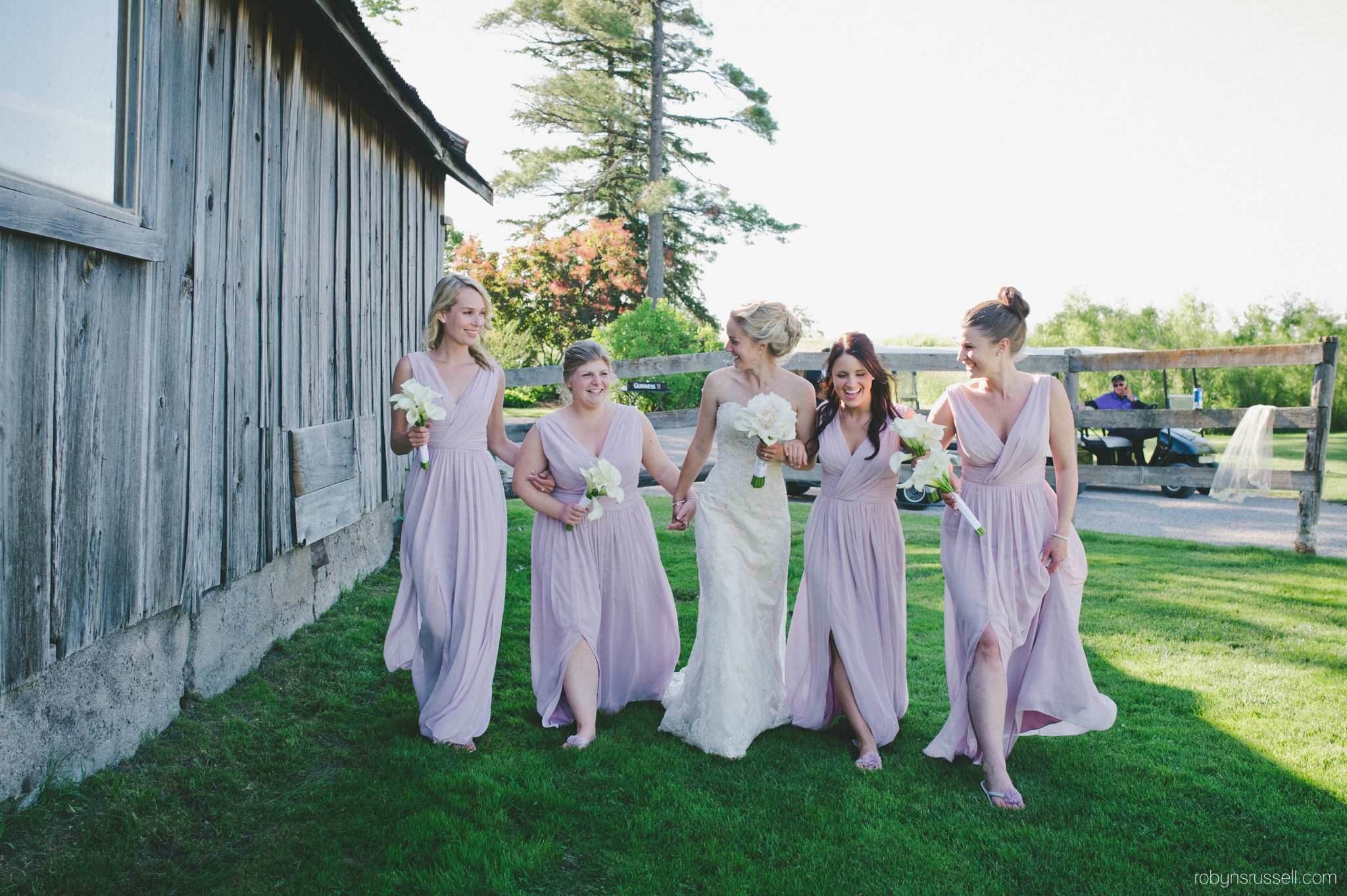 39-bride-and-bridesmaids-walking.jpg