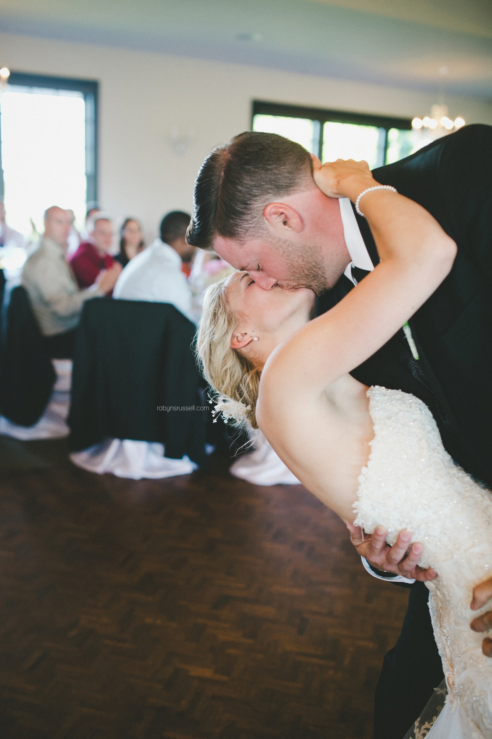 49-bride-and-groom-kiss-during-first-dance.jpg