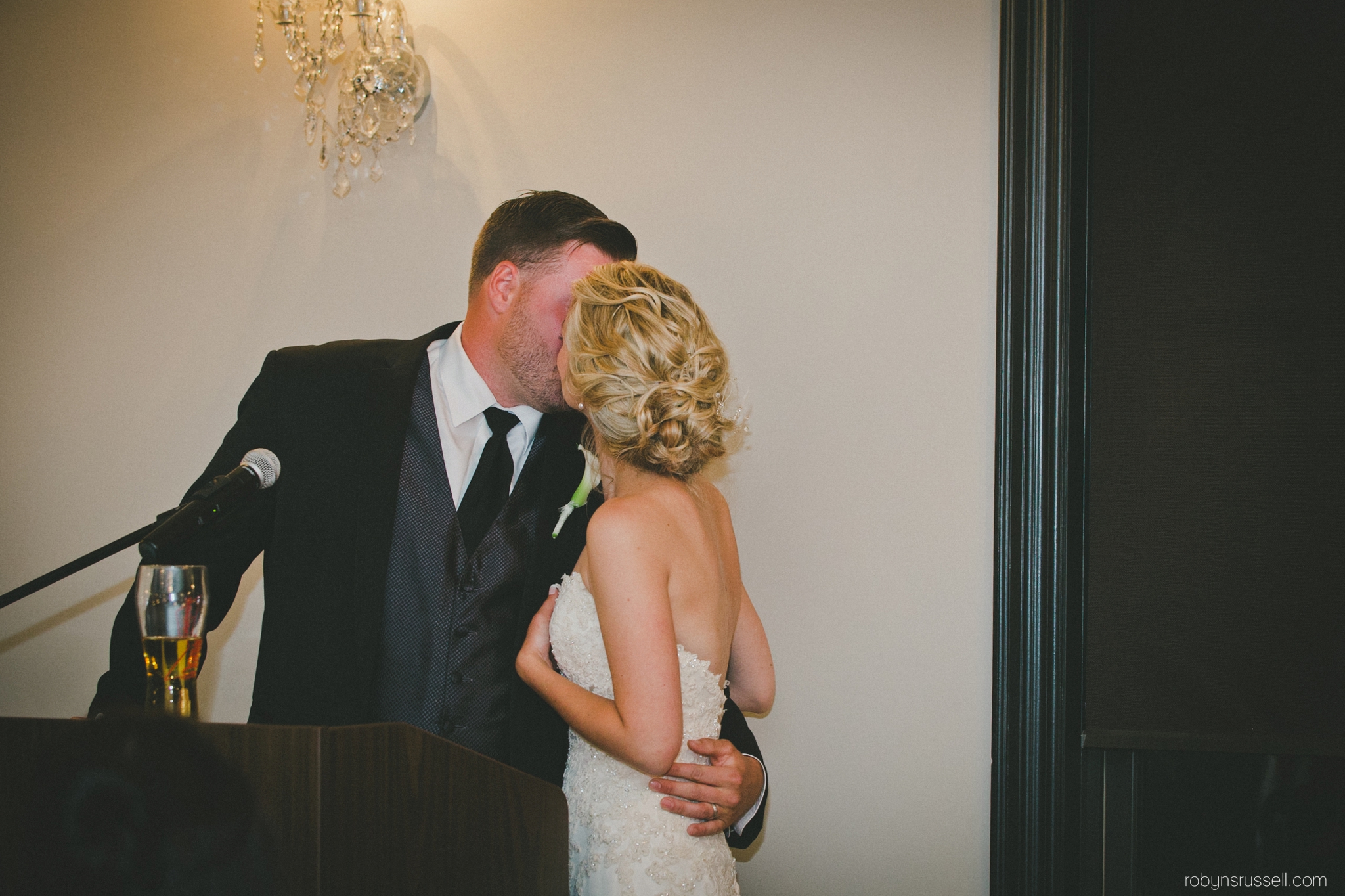 67-bride-and-groom-kiss-after-speech.jpg