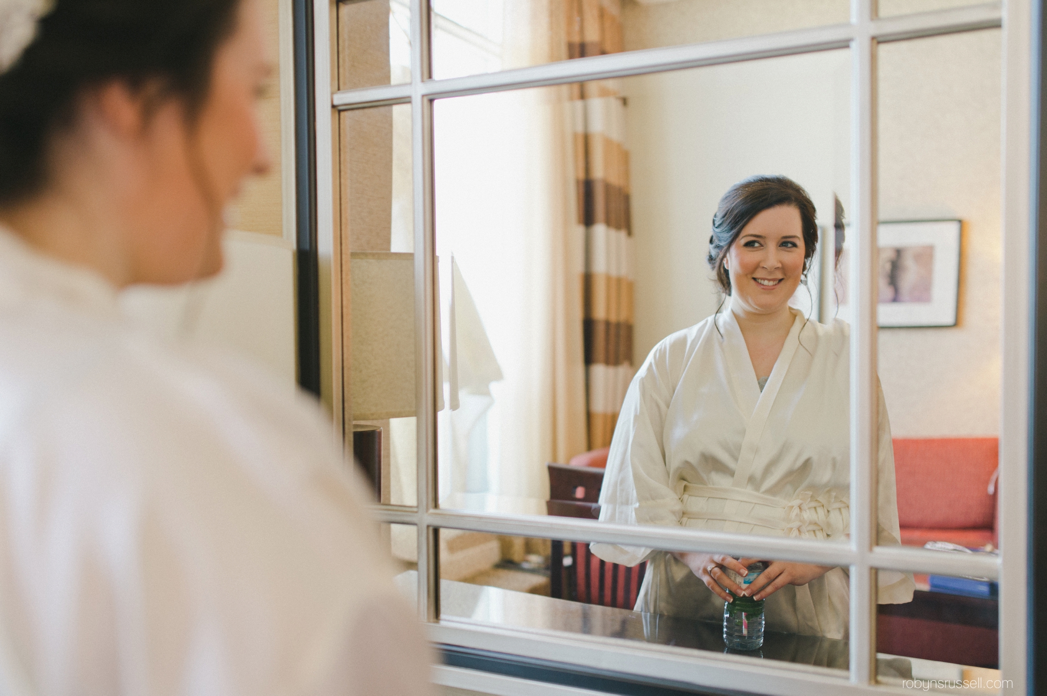 01-bride-looking-in-mirror.jpg