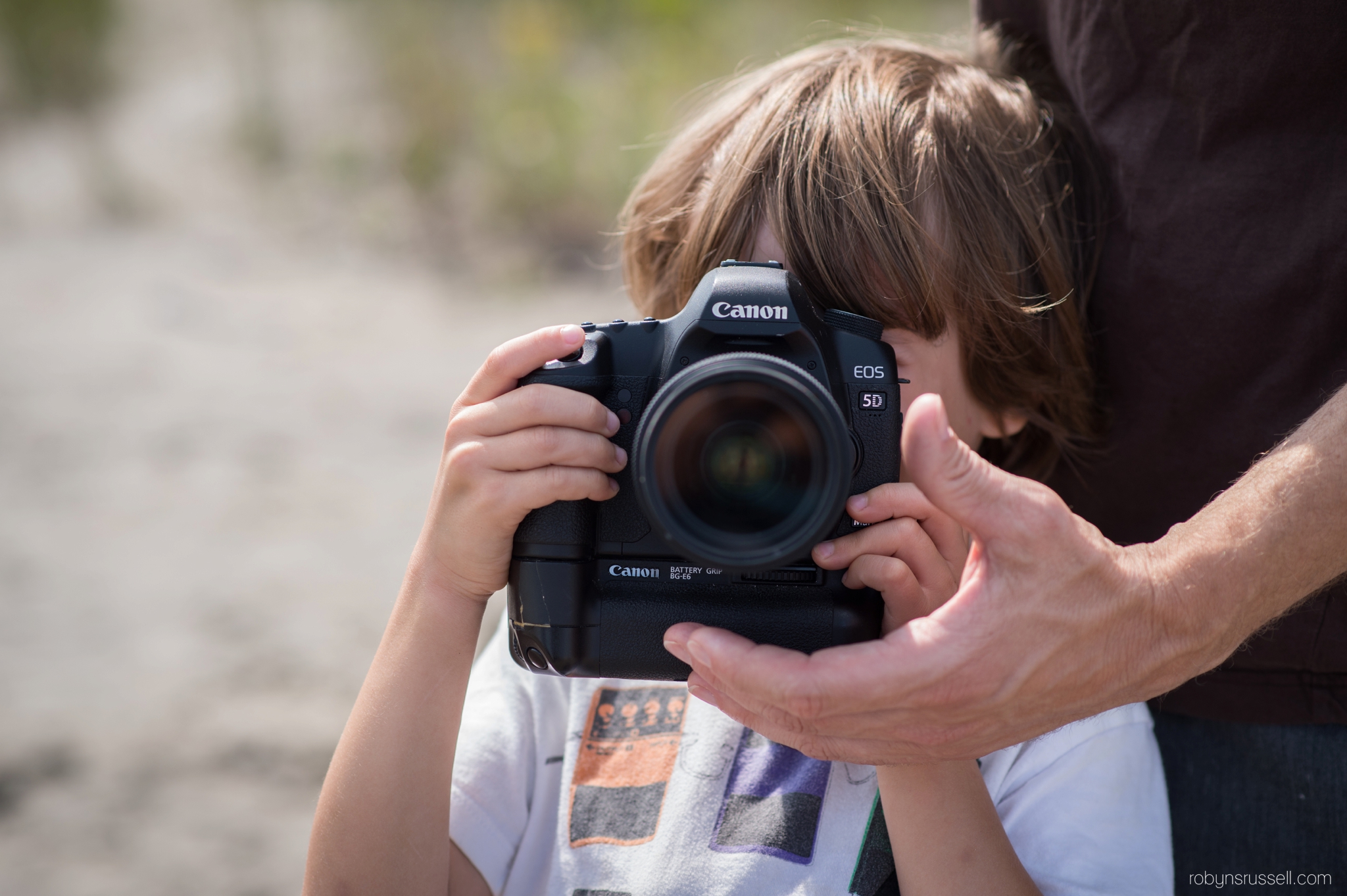 13-boy-taking-photographs.jpg