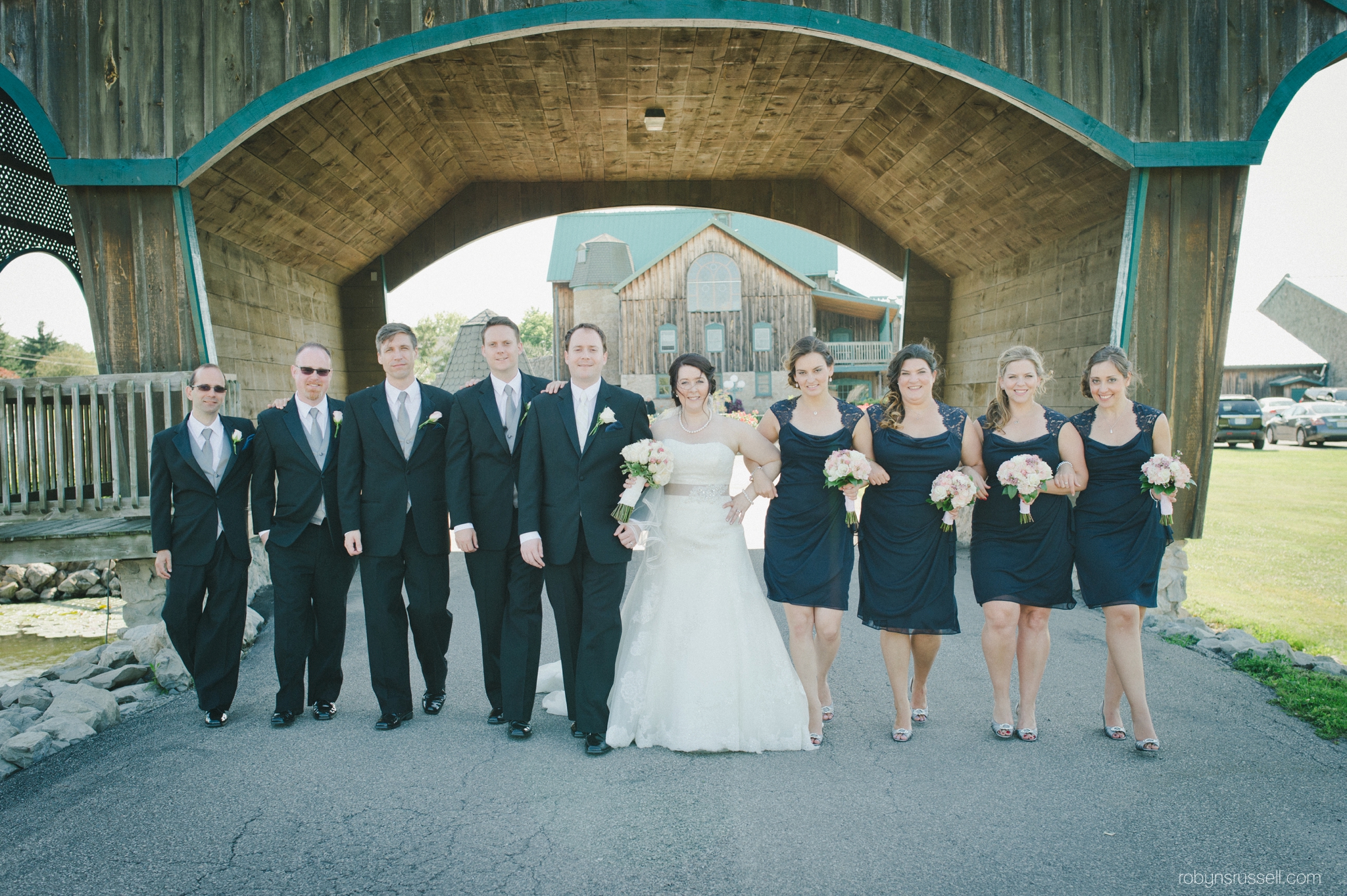 23-bridal-party-hernder-winery-bridge.jpg