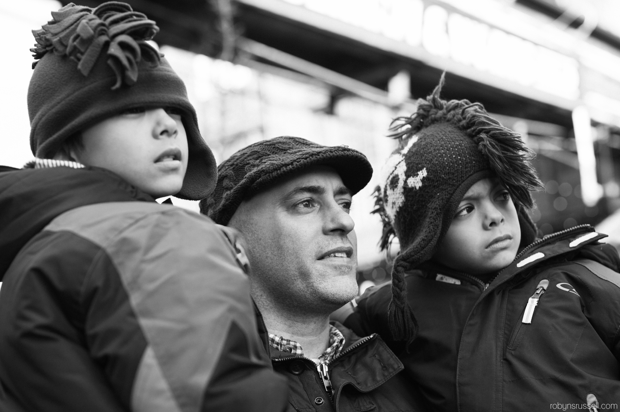 14-father-and-sons-enjoying-carolers-christmas-market-toronto.jpg