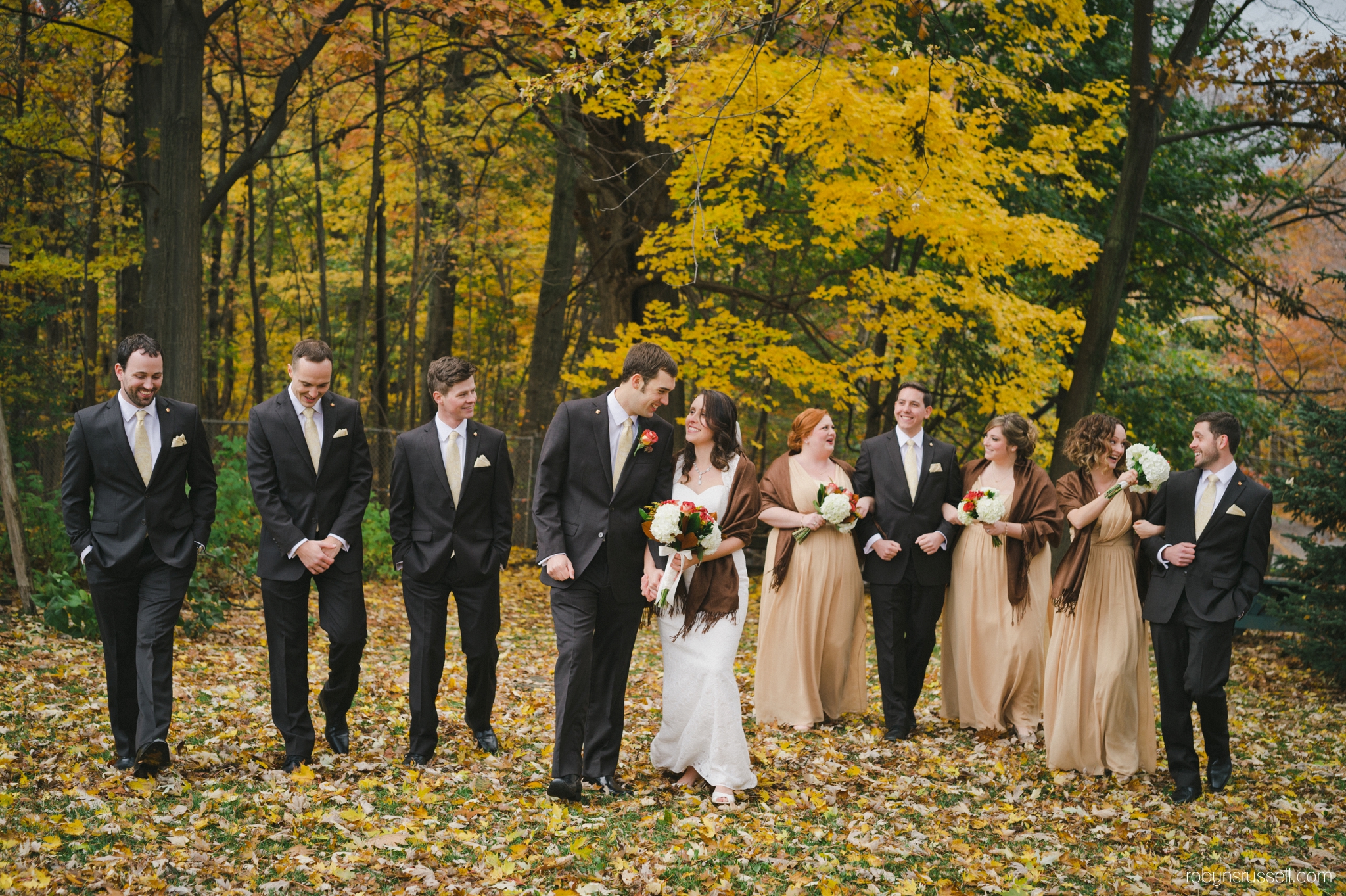 31-bridal-party-bradley-house-walking-fall-wedding.jpg