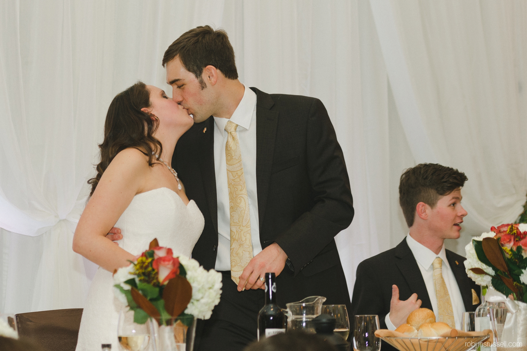 58-kissing-couple-on-wedding-day.jpg