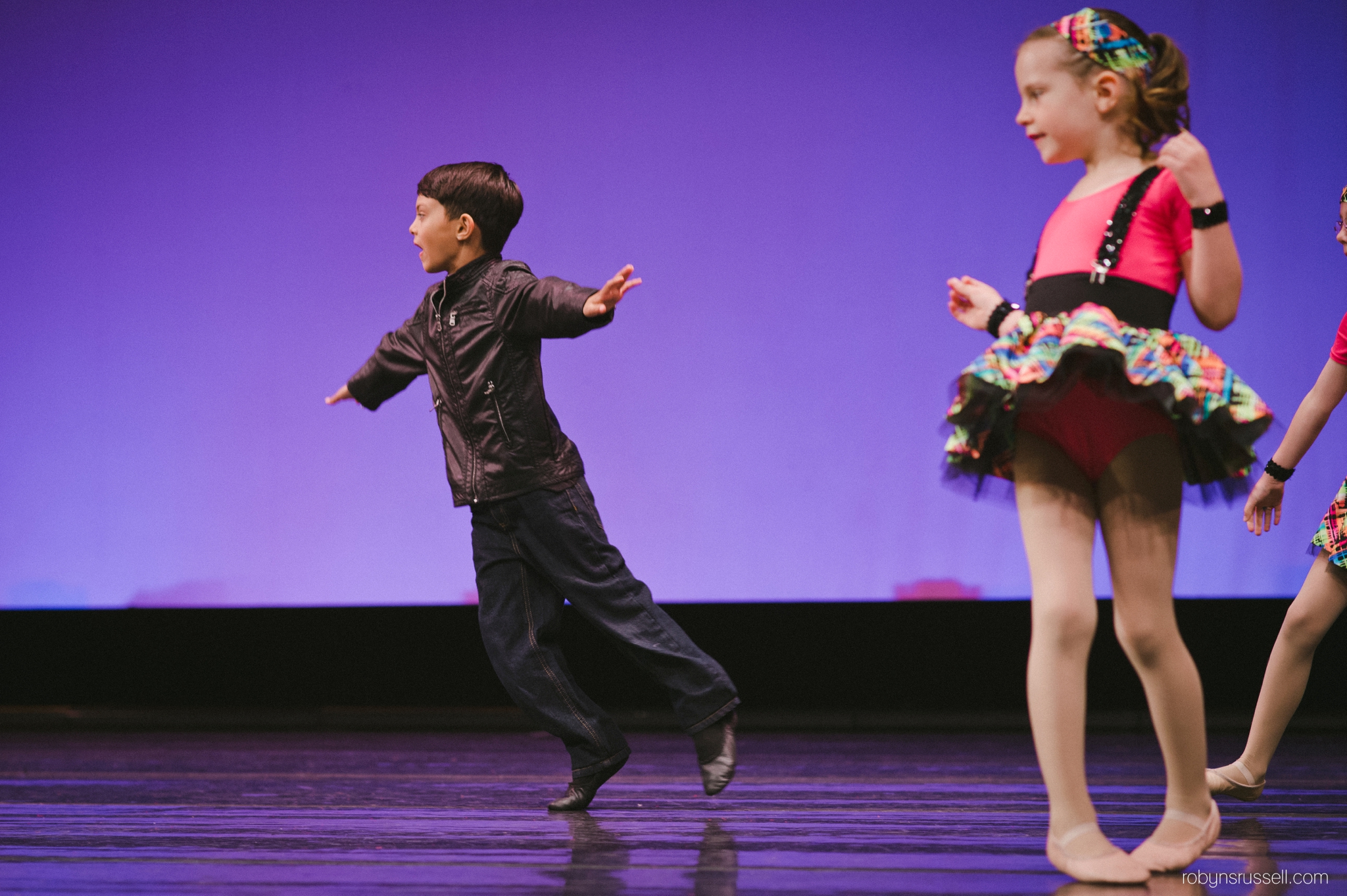 23-leaping-in-air-boy-dancer-owning-stage.jpg