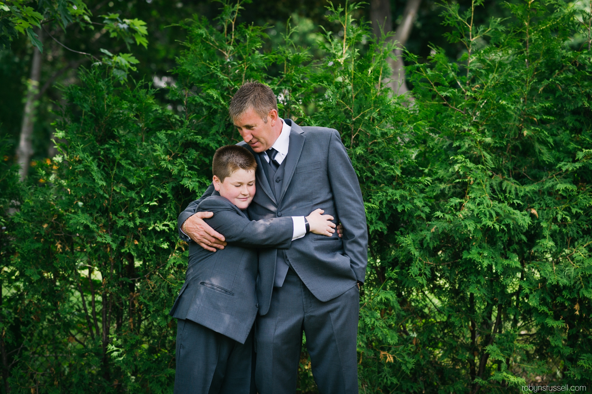 5-groom-and-son-emotional-moment-before-ceremony.jpg