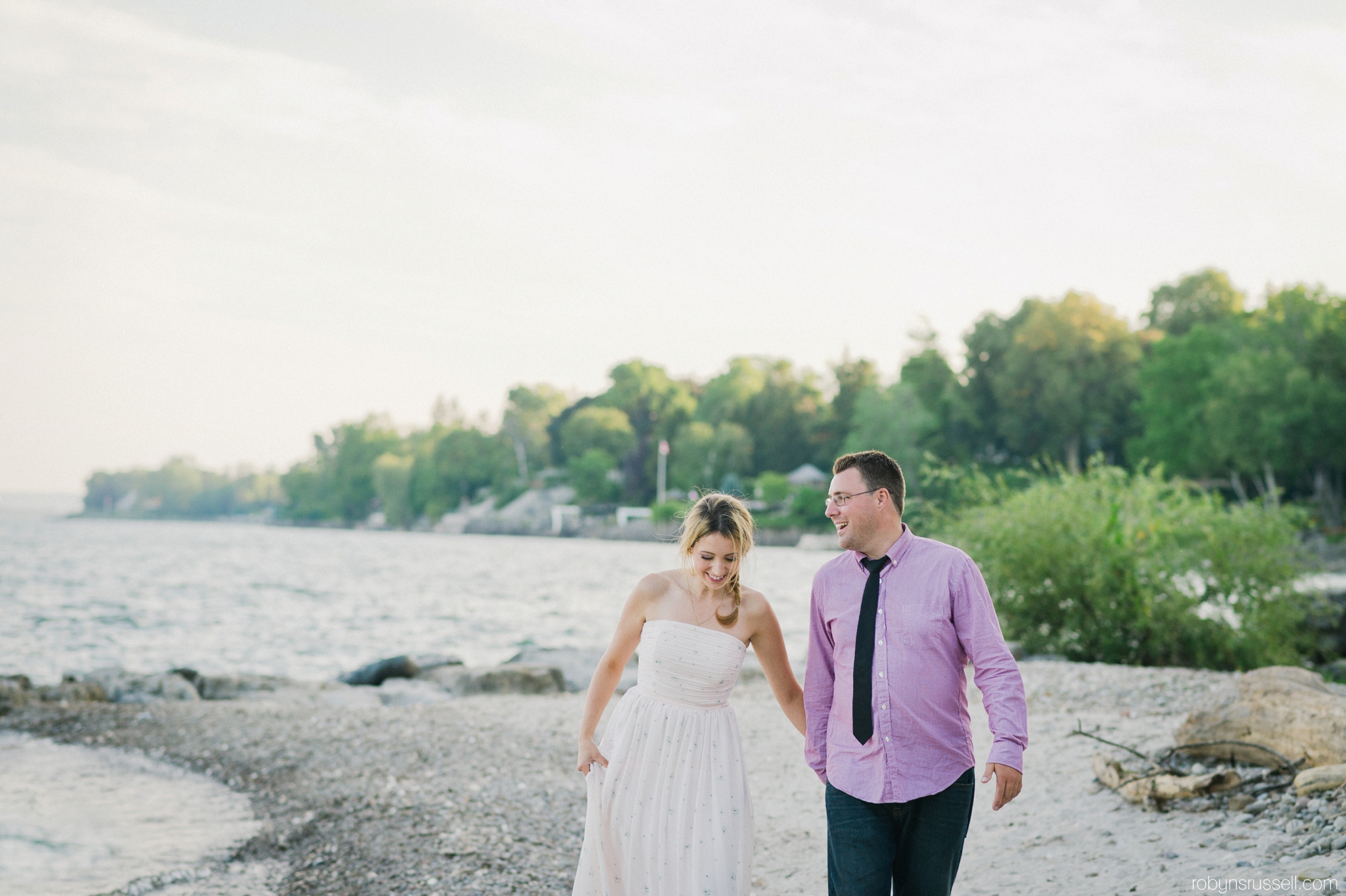 8-walking-along-the-water-burlington-paletta-engagement.jpg