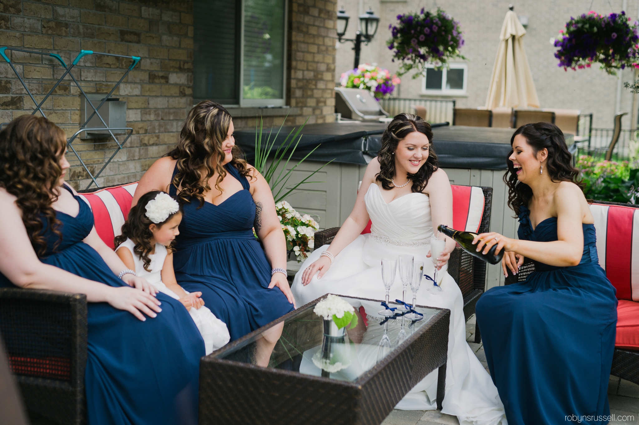 14-bride-and-bridesmaids-having-champagne-before-wedding.jpg