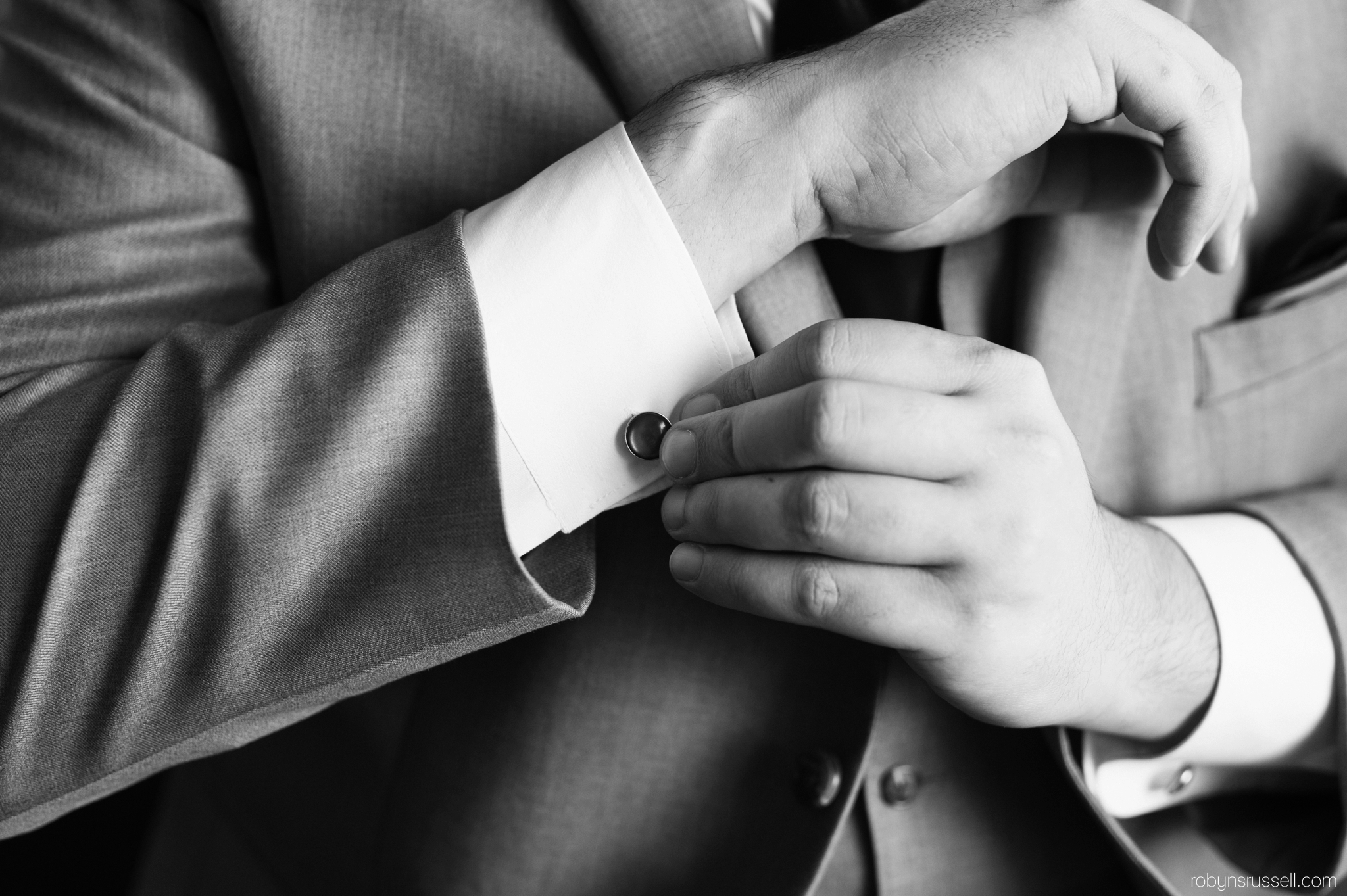 2-groom-adjusting-cufflinks-barrie-wedding-photographer.jpg