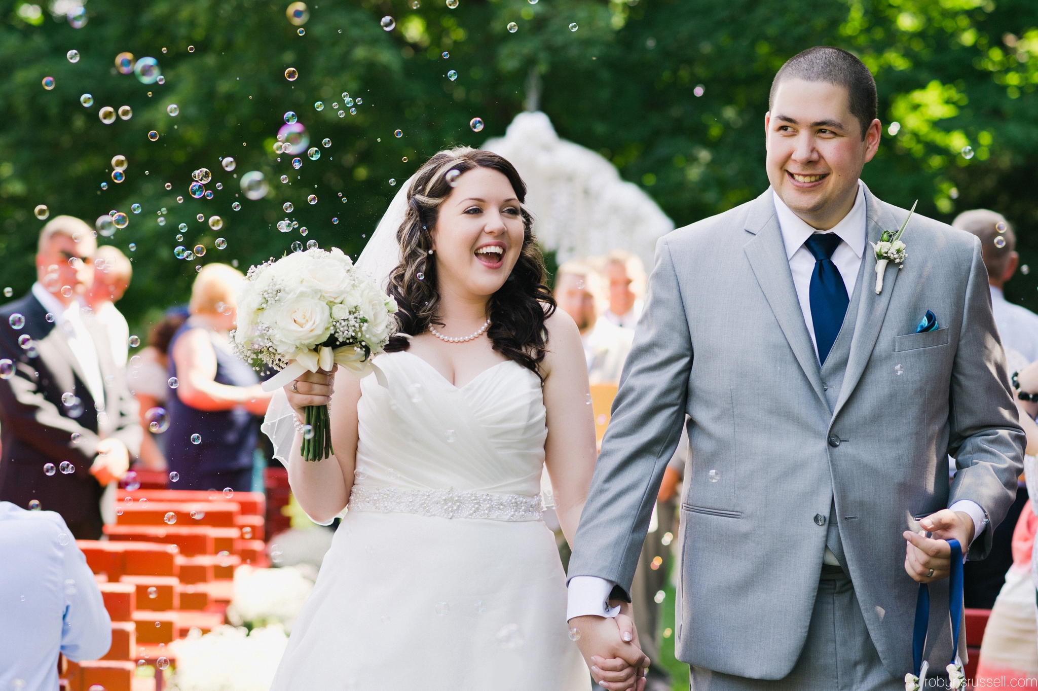 24-bride-and-groom-walk-to-bubbles-down-aisle.jpg