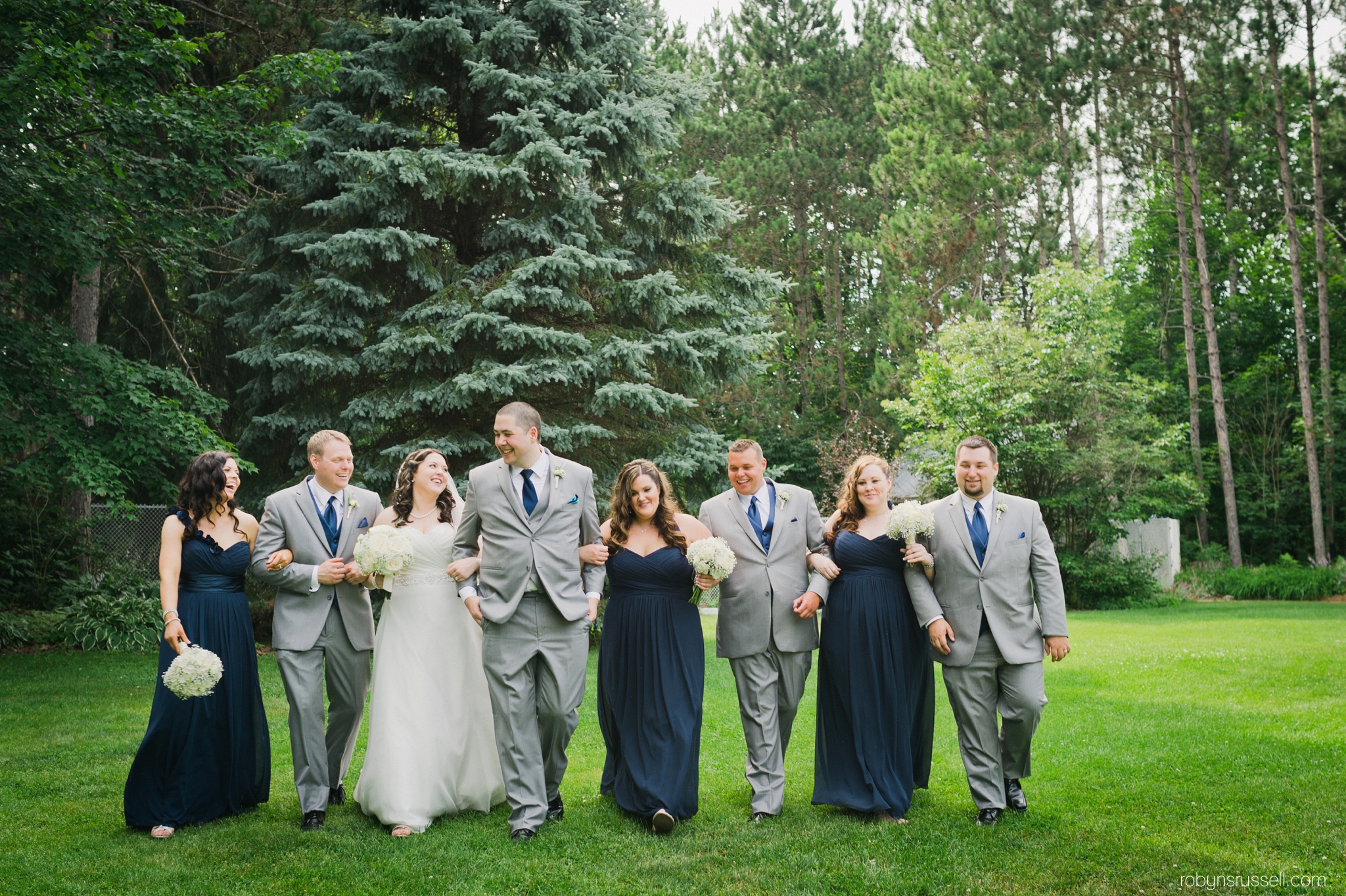 36-walking-shot-bridal-party-laughing.jpg