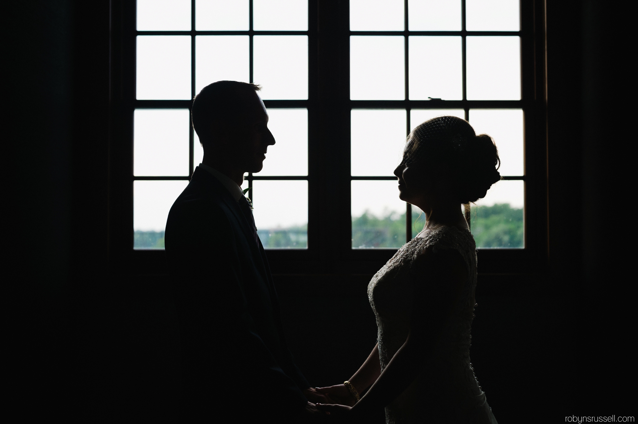 46-silhouette-shot-bride-and-groom-cambridge-mill.jpg