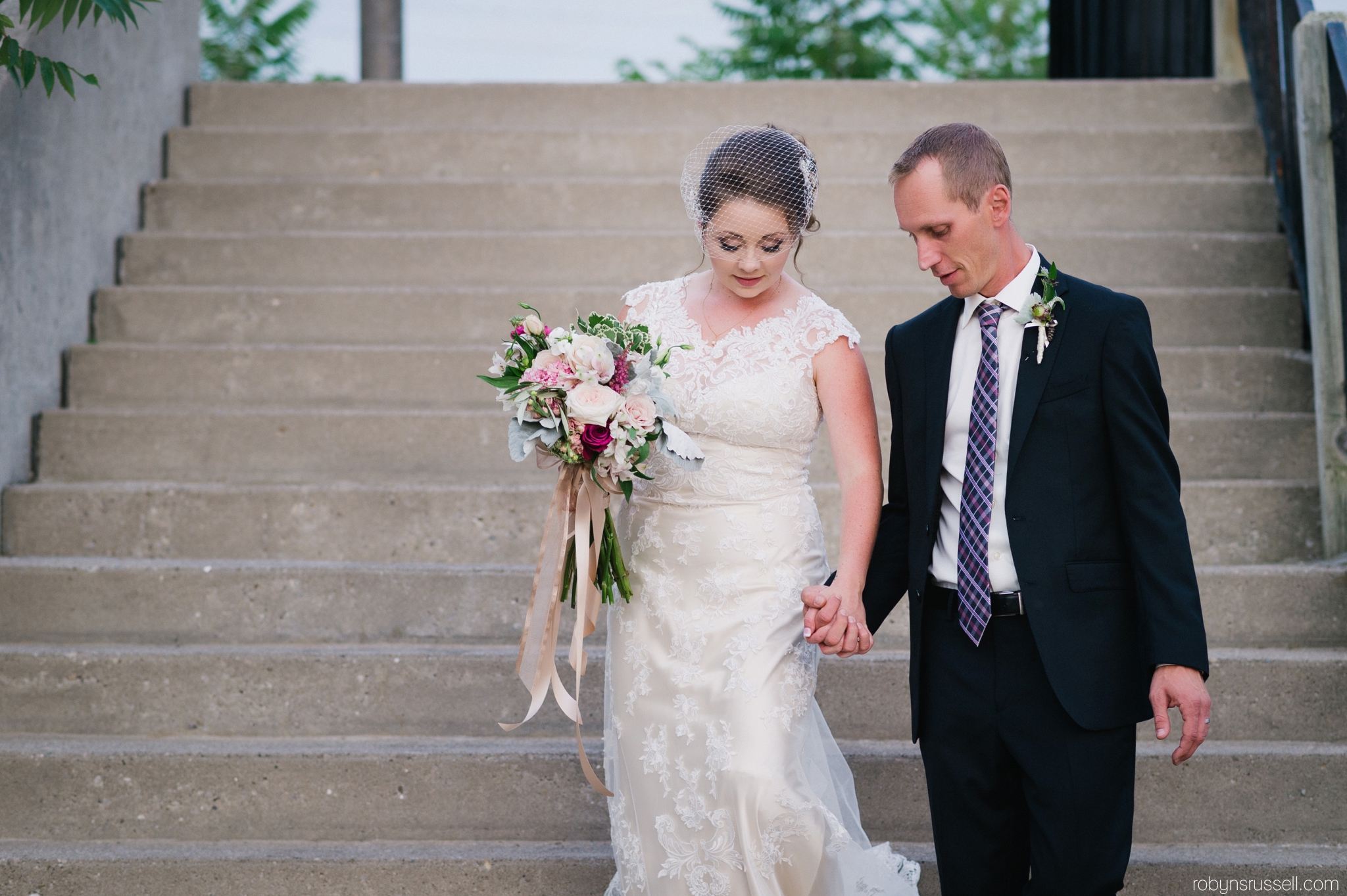 47-bride-and-groom-walking-at-cambridge-mill.jpg