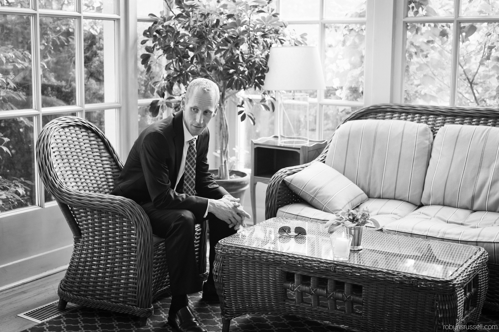 5-black-and-white-groom-sitting.jpg