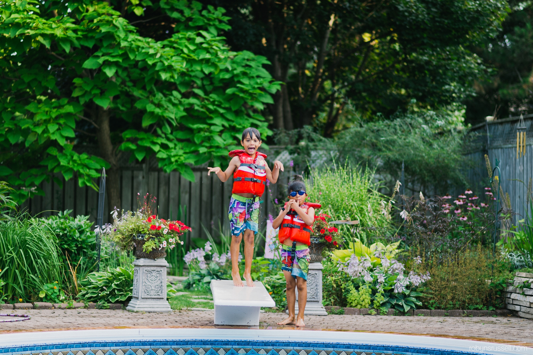 boys learning how to swim 