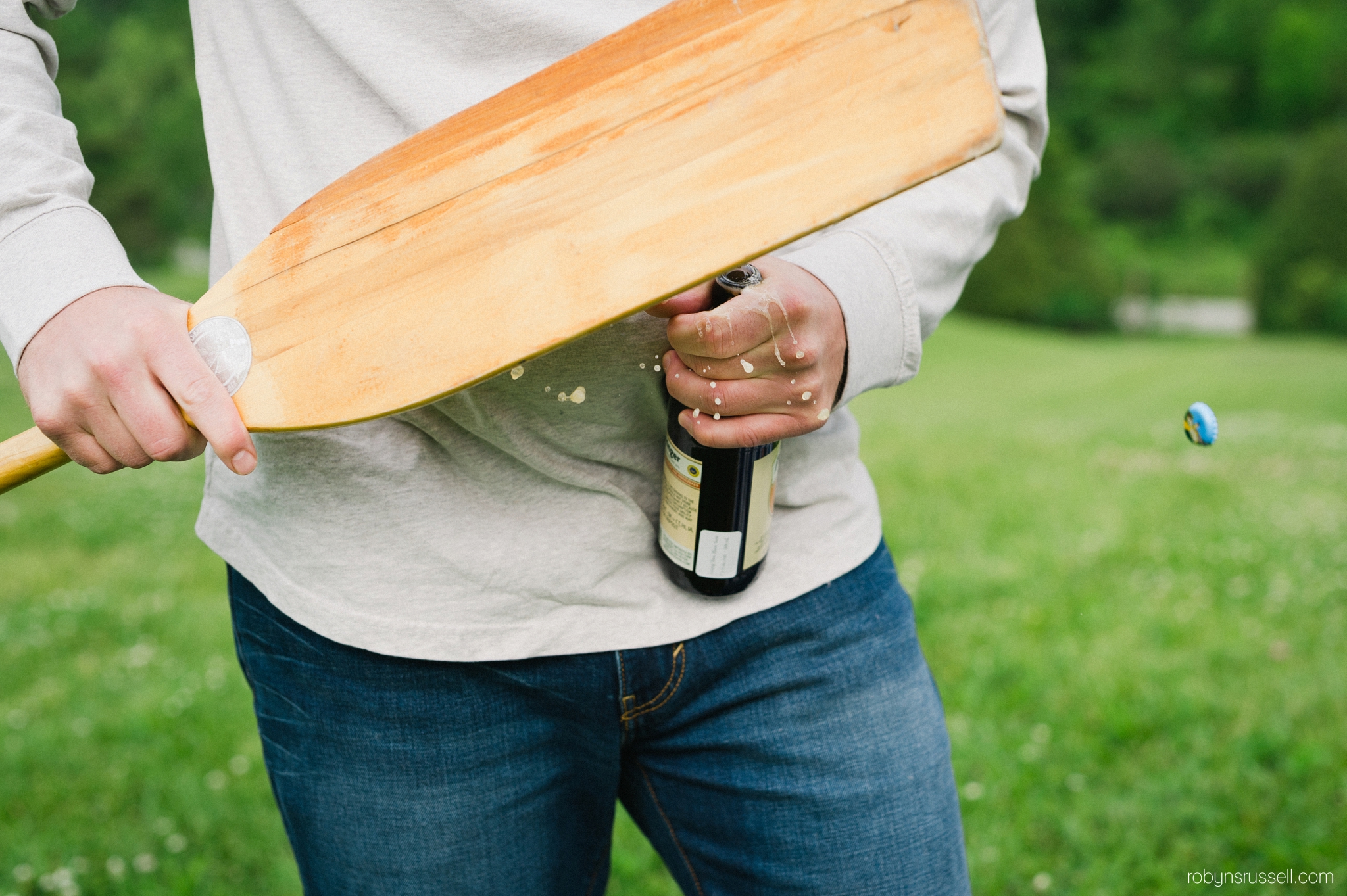 1-cracking-open-beer-with-a-paddle.jpg