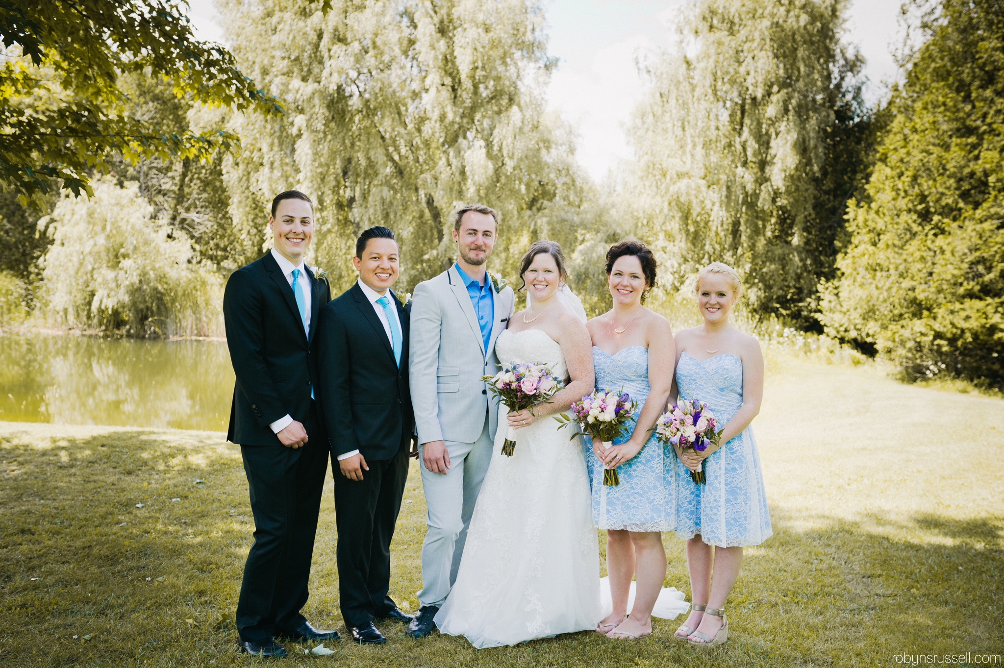 22-bridal-party-at-belwood-lake-wedding.jpg