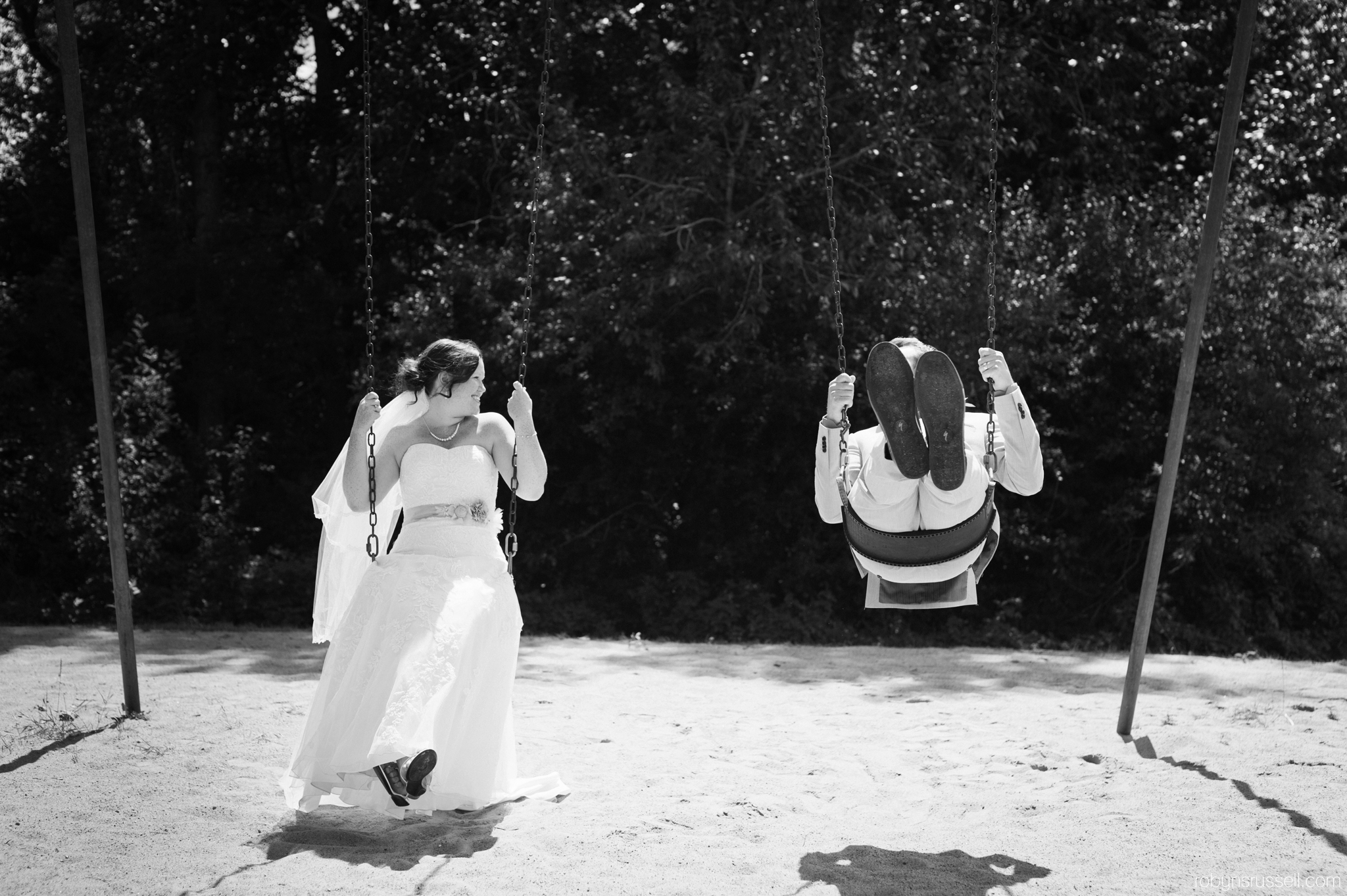 32-bride-and-groom-on-swings-burlington-wedding-photographer.jpg