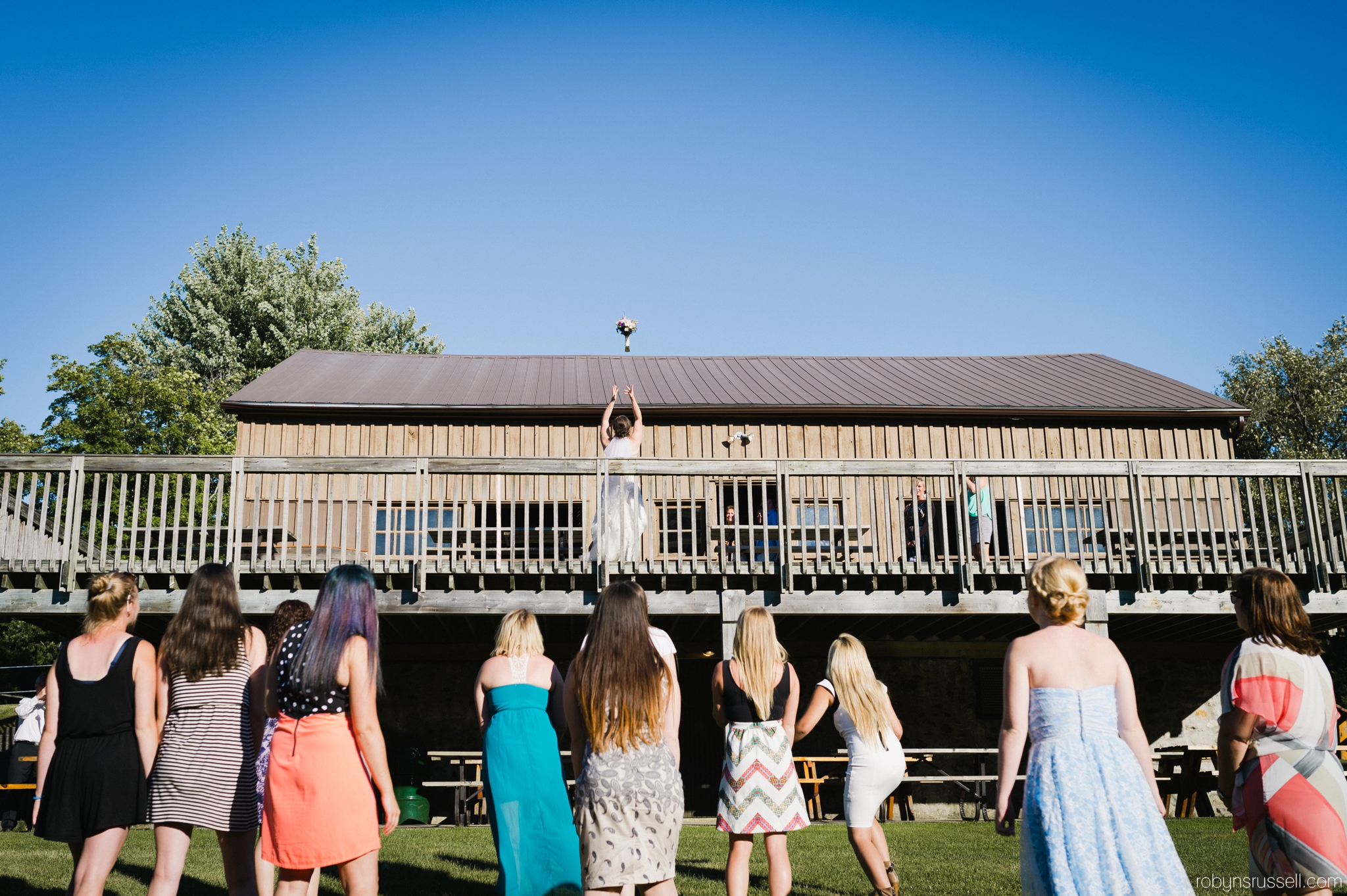 56-bridal-bouquet-toss-at-hampton-barn.jpg